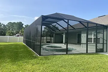 Bronze mMansard style pool enclosure by East Coast Aluminum
